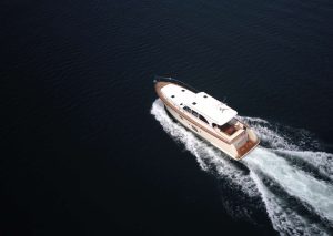 An aerial view of a yacht in open waters